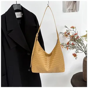Woven leather shoulder bag detail, stylish khaki hobo handbag, minimalist casual design
