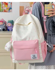 Charming pink and white star print school backpack detail, lightweight casual college style daily bag.