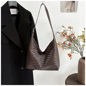 Casual large capacity woven shoulder bag for women, stylish commuting underarm tote.