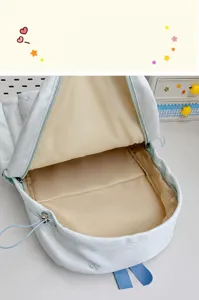 Korean minimalist school backpack, solid color with cute bow embroidery, spacious internal view.