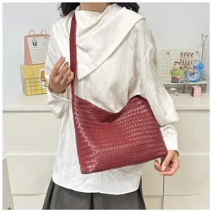 Casual large capacity woven shoulder bag for women, stylish underarm tote bag for daily commute.