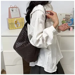 Dark brown woven leather shoulder bag, stylish commuter hobo bag with large capacity for daily wear.