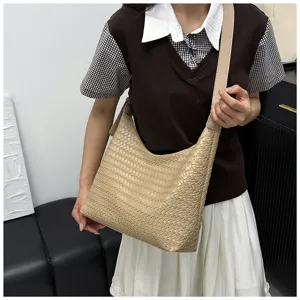 Chic beige woven leather shoulder bag for women, stylish underarm hobo bag for daily commute.