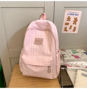 Light pink pleated student backpack, casual daily travel school bag for teenagers girls.