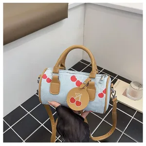 Chic denim cherry print barrel bag, stylish casual shoulder crossbody handbag for summer.