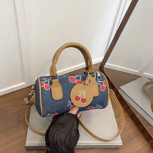Denim barrel bag with cherry print, casual shoulder crossbody bag and chic handbag for women