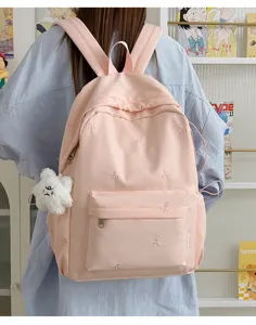 Pink student backpack with bow embroidery and plush pendant, casual daily school bag for girls!