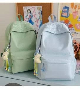 Minimalist aesthetic embroidered student backpack, large capacity casual travel daypack for women.