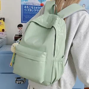 Minimalist large capacity school backpack for women and students with chic embroidery.