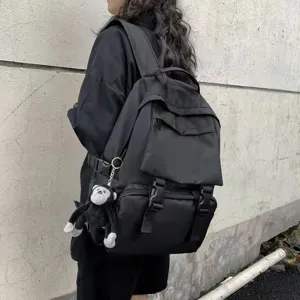 Black casual travel backpack with large capacity, durable multi-pocket design, stylish school bag