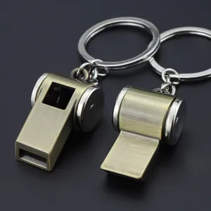 Creative vintage metal whistle keychain, retro bronze finish with silver ring, perfect gift.