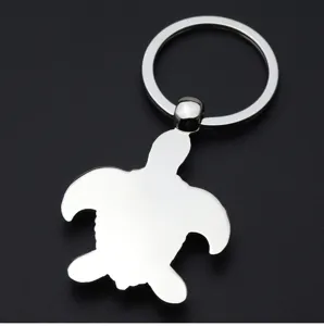 Metal sea turtle keychain detail view, polished silver finish, sturdy split ring.