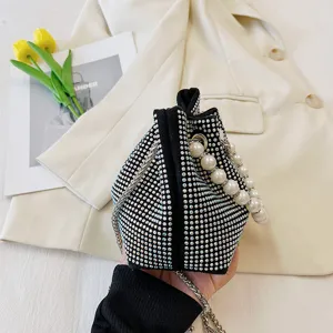 Elegant rhinestone pearl bucket bag with chain strap, stylish shoulder bag for women detail.