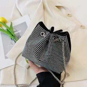 Stylish black rhinestone bucket bag with silver chain strap for women chic daily wear.