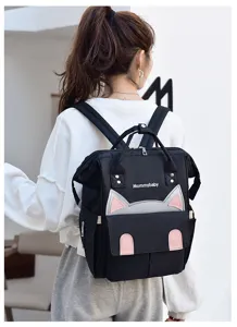 Stilvoller schwarzer Wickelrucksack mit Katzenohren und grossem Stauraum für Mütter.