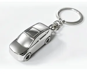 Close-up detail shot of a sleek silver metal car model keychain, zinc alloy pendant for keys.