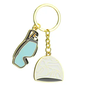 Swimming themed metal keychain with cute goggles and swim cap pendants in gold tone.