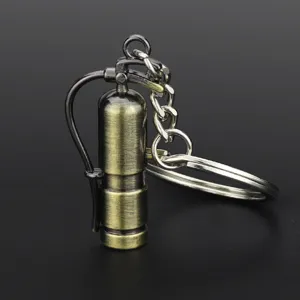Miniature fire extinguisher metal keychain, creative novelty safety gift key ring for daily use.