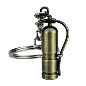Miniature metal fire extinguisher keychain, creative novelty keyring for daily bag decor.