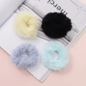 Cute fuzzy hair scrunchies set in four colors, soft plush winter hair ties for women and girls.