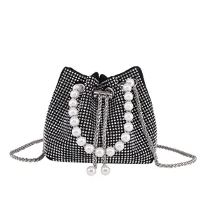 Rhinestone bucket bag for women, stylish crystal sparkling shoulder bag with faux pearl handle.