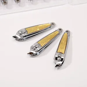 Stainless steel angled nail clippers set with elegant gold floral pattern handles for precise grooming.