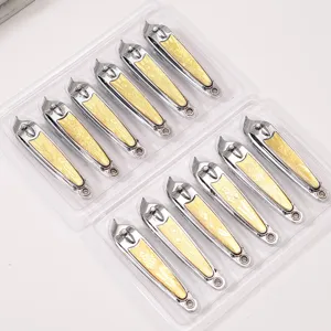 Stainless steel slanted nail clipper set with golden floral engraved handle design for daily use.