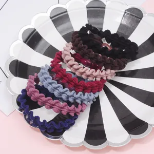 Detailed view of colorful wavy braided hair ties elastic hair ropes for daily styling.