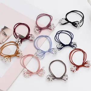 Multi-layer elastic hair ties with elegant pearl bow design, stylish ponytail holders for daily use.