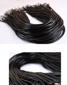 Detailed close-up view of black waxed cord necklace rope with metal clasps for DIY jewelry.
