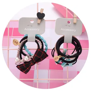 Cute hair ties set with bows and pearls, stylish scrunchies for women and girls daily wear.