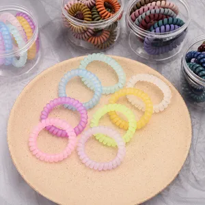 Matte phone cord hair ties for women, seamless spiral hair bands, stylish colorful bracelet hair ropes.