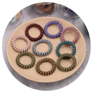 Matte spiral hair ties for women, seamless telephone wire hair bands in assorted colors.