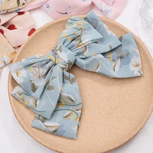 Light blue floral chiffon hair bow clip, sweet style spring hairpin for women and girls daily wear.