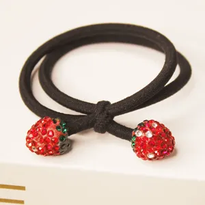 Black elastic hair tie featuring sparkling rhinestone strawberry charms for women and girls daily styling.