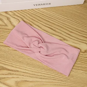 Bandeau de sport noué côtelé rose pour femmes fitness yoga course absorbant la sueur.