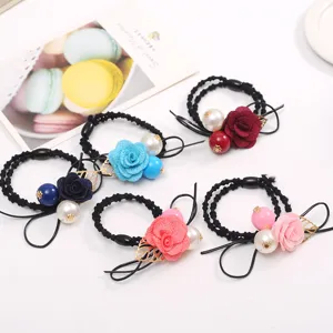 Floral hair tie with pearls and gold leaf accents, elegant elastic hair rope for women girls.