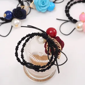 Elegant floral hair ties with faux pearls and gold leaves, cute hair accessories for daily wear.