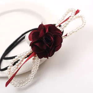 Elegant camellia flower and pearl beaded hair tie elastic rope for women and girls daily wear.