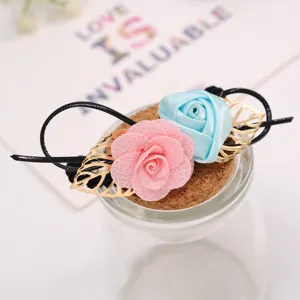 Sweet double rose hair tie with gold leaf design, elegant floral scrunchie for women and girls.