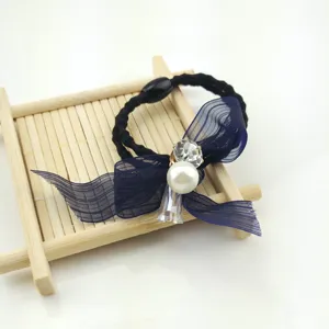 Elegant navy blue organza bow hair tie with pearl and crystal rhinestone for women and girls.