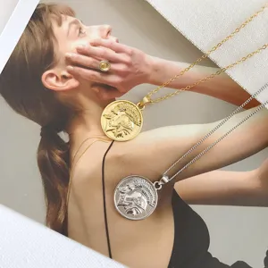 Vintage coin pendant necklace set, gold and silver tone ancient warrior medallion jewelry.