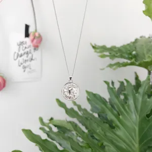 Silver coin pendant necklace, vintage portrait charm on a delicate chain for women.