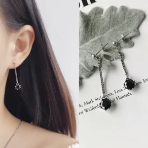 Details of the sterling silver black zircon chain drop earrings, showing unique vintage style.