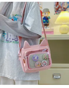 Pink cat ear ita bag with transparent front pocket, cute shoulder crossbody bag for girls.