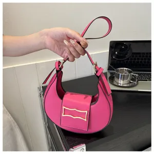 Hot pink crescent underarm bag, trendy chic minimalist fashion shoulder bag for women.