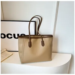 Vintage large capacity PU leather shoulder tote bag for women, stylish commuting daily.