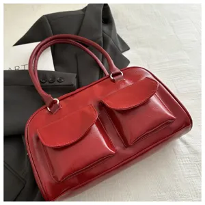 Red glossy leather bowling shoulder bag with dual front flap pockets for women vintage style