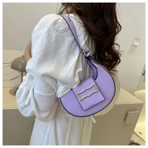 Trendy purple crescent underarm shoulder bag for women, chic minimalist fashion handbag.