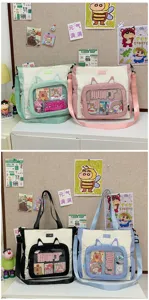 Canvas itabag tote bag detail view showing transparent front window with cat ears.